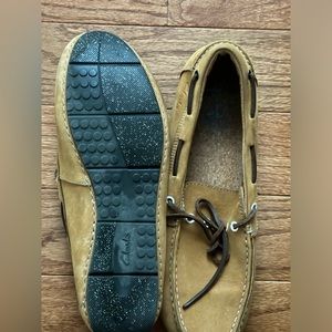 Clark’s beige slip-on loafers